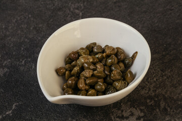 Tasty capers in the bowl