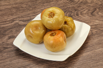 Pickled green tomato in the bowl