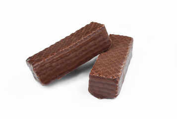 Two chocolate coated wafers isolated on white background. Tasty dessert
