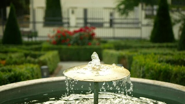 Garden park in Olomouc, fountain iron landmark historical monument reserve architecture memorial, tank water jet height spout spouting squirt spring, on walls during reign of Maria Theresa, baroque