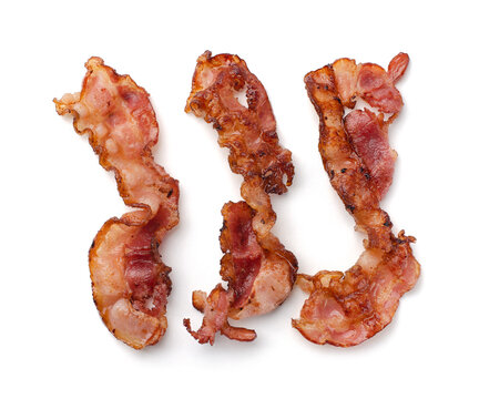 Three slices of fresh fried bacon lined up in a row isolated