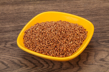 Raw buсkwheat cereal in the bowl