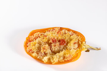 Cuscus, oven-roasted yellow pepper stuffed with couscous with vegetables