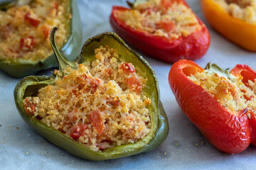 Cuscus, roasted peppers fresh from the oven stuffed with couscous with vegetables