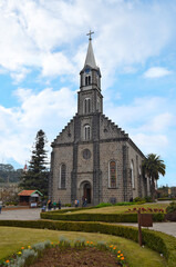 Fototapeta na wymiar Catedral Nossa Senhora de Lourdes (Cathedral of Our Lady of Lourdes), also known as Catedral de Pedra (Cathedral of Stone), is a Catholic church located in the brazilian city Canela, Rio Grande do Sul