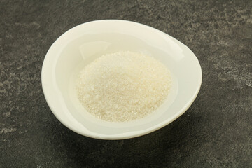 White sugar in the bowl
