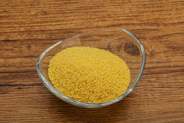 Raw cous cous heap in the bowl