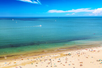 Aerial view of Rimini beach with people and blue water. Summer vacation concept.