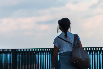 Fototapeta premium woman walks around the coast
