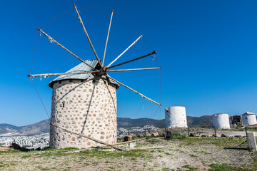 old windmills located in the bodrum of the high hill in Turkey.