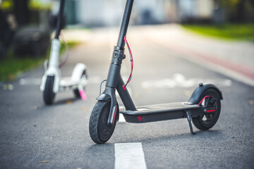 Close up details of electric scooter on the road. Ecological and urban transport in the city © Zedspider