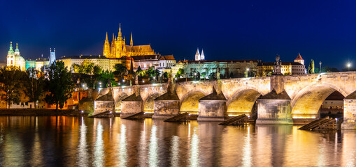 Prague night panorama. Prague Castle and Charles Bridge above Vltava River, Praha, Czech Republic