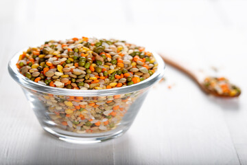 Colorful various beans or lentils and whole grains seeds or cereal in bowl 