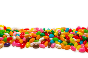 Colorful jelly beans isolated on white. Top view.