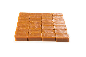 Tasty caramel candy isolated on white background.