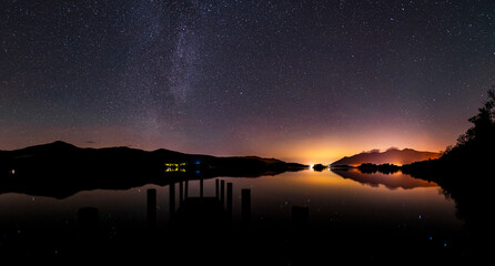 Fototapeta na wymiar A panoramic nightscape from Ashness Jetty on Derwent water in the Lake District