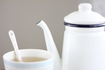 Cup of tea and teapot
