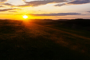 Beautiful light of the sunset over hills