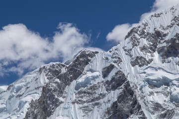 Close view on mount Nuptse ridge with a peak of Everest on the background at Khumbu region, Sagamartha national park, Himalaya, Nepal