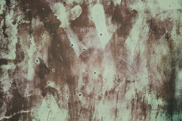 Old rusty metallic green painted abstract background.