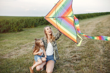 Mother with daughter. Kite with family.