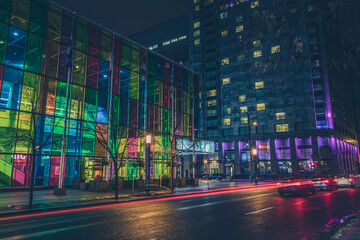 Colourful Buildings and Streaking Lights Downtown at Night