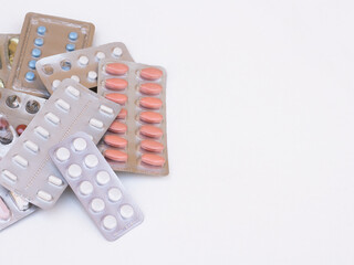Assorted medicine tablets isolated on white background. Various medicine tablets and pills different colors