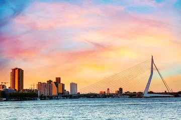 Papier Peint photo Pont Érasme Rotterdam panorama. Erasmus bridge over the river Meuse with skyscrapers in Rotterdam, South Holland, Netherlands during twilight sunset.