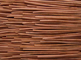 the peeled copper conductors of the wire lie in rows.