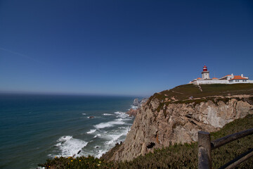 Fototapeta na wymiar The Lone Clifftop Lighthouse Guarding the Coast