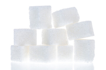 Close up of sugar cubes isolated on white background.