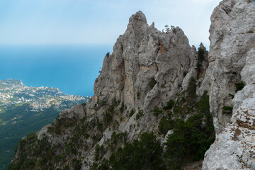 Fototapeta na wymiar Seascape from Mount Ai-Petri. View of the sea and residential areas, Crimean peninsula
