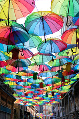 Fototapeta na wymiar Background colorful rainbow different color umbrellas. unban tourist street decoration. Istanbul, Karakoy