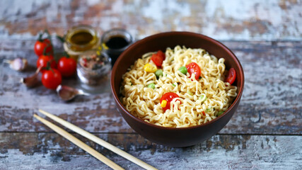 Chinese style noodle bowl. Spicy noodle soup.