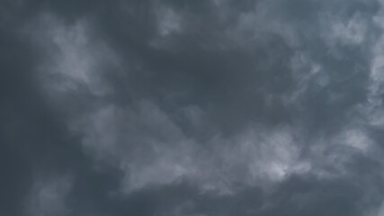 Dark grey sky with clouds. Spring. Abstract Background