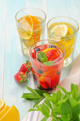 Detox fruit infused flavored water. Refreshing summer homemade cocktail