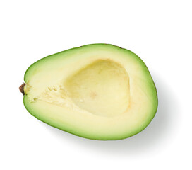 half ripe green avocado pitted isolated on white background