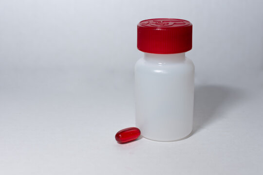 Red Pill And Bottle Isolated