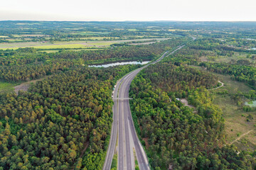 Motorway sceen goes through countryy side green