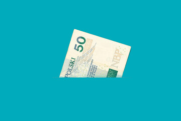 Fifty zloty bill in a pocket. Money close up. Abstraction