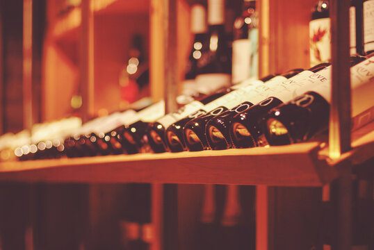 bottles of wine in wine bar or wine shop for soft background