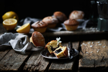 lemon blueberry muffins.dark photo..style rustic
