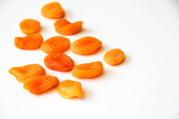 Dried apricots on a white background. Back view.