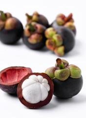 Tropical mangosteen on white background