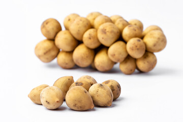 Langsat fruit on white background.