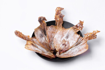 dried squids on white background