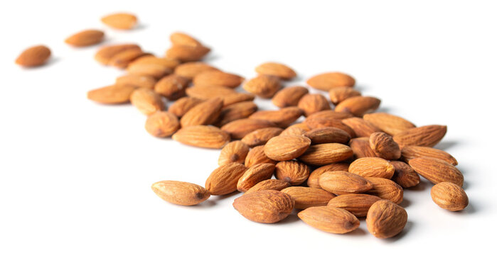 full almond nut on white isolated with clipping path