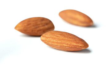 almond close up focus one almond depth of field  isolated on the white background