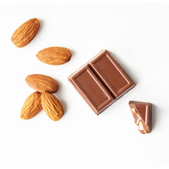 topview almond milk chocolate Crack pieces on white isolated