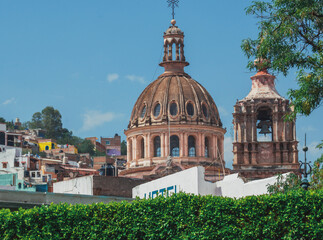 Fototapeta na wymiar Colonial Dome Church with Cross in Guanajuato Mexico.